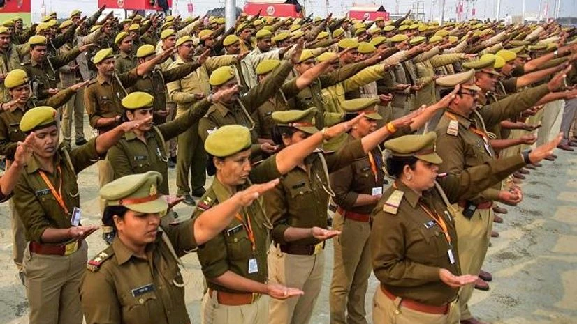 Police take oath with Ganga Jal in one hand ahead of their duty in Kumbh Mela 2019, in Allahabad Police take oath with Ganga Jal in one hand ahead of their duty in Kumbh Mela 2019, in Allahabad