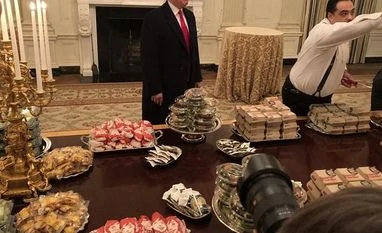 Shutdown makes Trump order a fast-food feast for college football champions trump