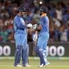 India's Virhat Kohli celebrates his 100 against Australia with teammate M.S. Dhoni during their one day international cricket match in Adelaide, Australia, Tuesday | Photo: PTI