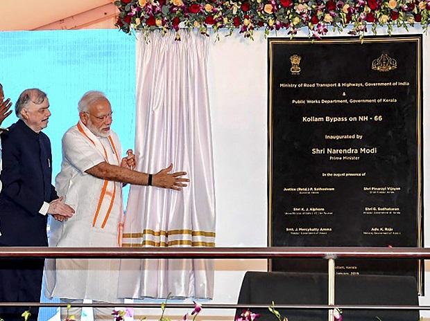 Modi visit to Padmanabhaswamy Temple, Inauguration of Kollam bypass in pics