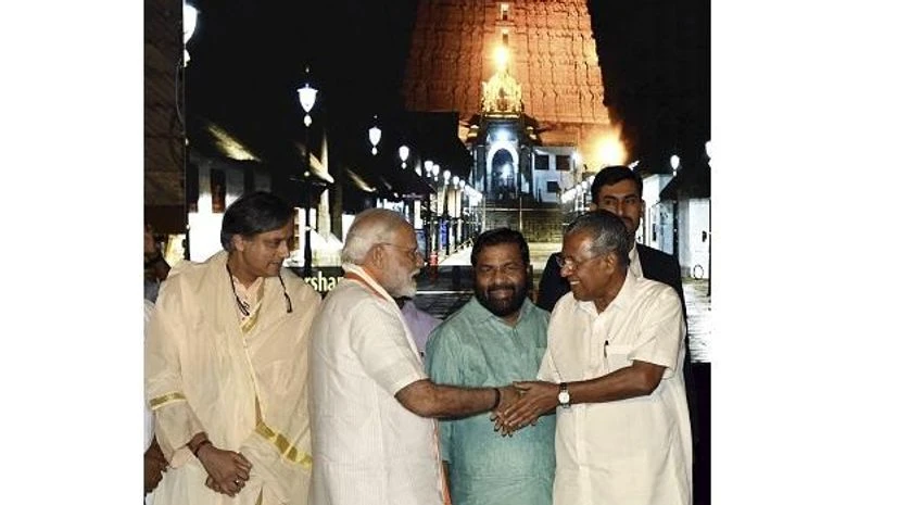 Modi being greeted by Kerala Chief Minister Pinarayi Vijayan Modi being greeted by Kerala Chief Minister Pinarayi Vijayan