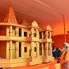 People look at a model of Ram Mandir, to be built in Ayodhya showcased at Kumbh Mela festival 2019, in Allahabad | Photo: PTI