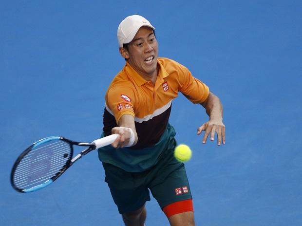 Japan's Kei Nishikori in action against Spain's Pablo Carreno Busta Japan's Kei Nishikori in action against Spain's Pablo Carreno Busta