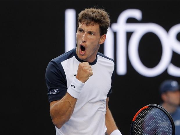 Spain's Pablo Carreno Busta reacts during the match against Japan's Kei Nishikori Spain's Pablo Carreno Busta reacts during the match against Japan's Kei Nishikori
