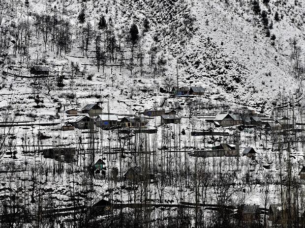 A view of snow-covered village on the outskirts of Srinagar A view of snow-covered village on the outskirts of Srinagar