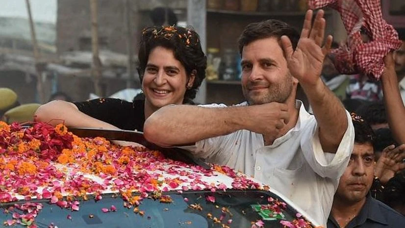 Priyanka Gandhi, Rahul Gandhi In this May 4, 2014 file photo Priyanka Vadra is seen with her brother and Congress President Rahul Gandhi during a road show in Amethi (Photo: PTI)