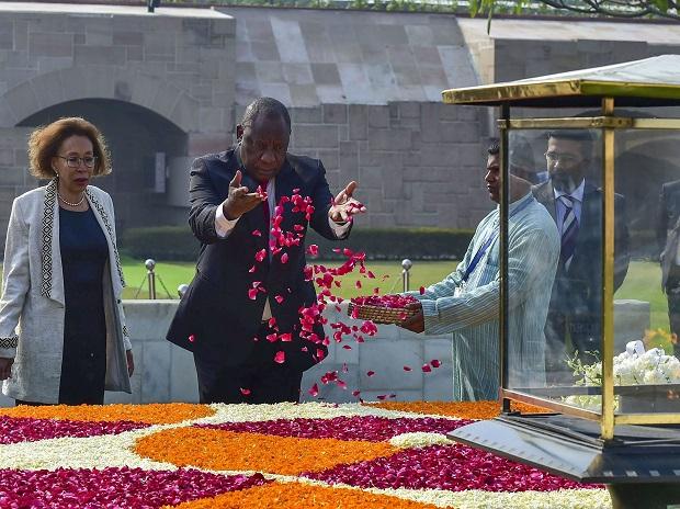Cyril Ramaphosa along with his wife Tshepo Motsepe pays homage at Mahatma Gandhi's memorial Rajghat in New Delhi Cyril Ramaphosa along with his wife Tshepo Motsepe pays homage at Mahatma Gandhi's memorial Rajghat in New Delhi