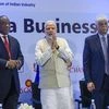 Modi, South African President Cyril Ramaphosa and CII President Rakesh Bharti Mittal during the India-South Africa Business Forum meeting