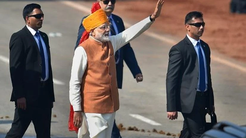 Prime Minister Narendra Modi waves at the crowd after attending the 70th Republic Day celebrations at Rajpath Prime Minister Narendra Modi waves at the crowd after attending the 70th Republic Day celebrations at Rajpath