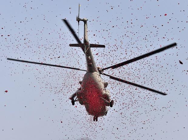 A helicopter shower flowers during the 70th Republic Day celebrations at Red Road A helicopter shower flowers during the 70th Republic Day celebrations at Red Road