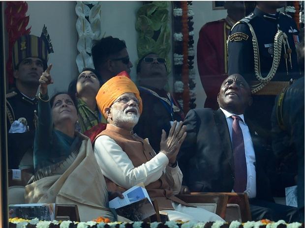 Chief Guest South African President Cyril Ramaphosa, PM Narendra Modi and Defence Minister Nirmala Sitharaman react while watching the fly-past Chief Guest South African President Cyril Ramaphosa, PM Narendra Modi and Defence Minister Nirmala Sitharaman react while watching the fly-past