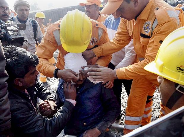 An NDRF personnel treats an injured passenger after the Delhi-bound Seemanchal Express derailed at Hajipur An NDRF personnel treats an injured passenger after the Delhi-bound Seemanchal Express derailed at Hajipur