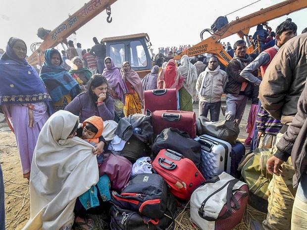 Passengers of the derailed Delhi-bound Seemanchal Express train wait for transportation at Hajipur Passengers of the derailed Delhi-bound Seemanchal Express train wait for transportation at Hajipur