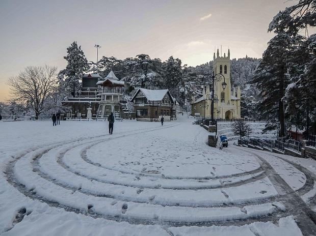 A view of snow-covered street as daily life resumes following heavy snowfall, at Ridge in Shimla A view of snow-covered street as daily life resumes following heavy snowfall, at Ridge in Shimla