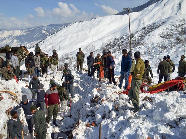 Rescue workers clear snow after an avalanche near Jawahar Tunnel that trapped 10 policemen on the Srinagar-Jammu National Highway, at Qazigund in Kulgam district Rescue workers clear snow after an avalanche near Jawahar Tunnel that trapped 10 policemen on the Srinagar-Jammu National Highway, at Qazigund in Kulgam district