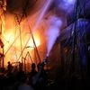 Firefighters work at the scene of a fire that broke out at a chemical warehouse in Dhaka | Photo: Reuters