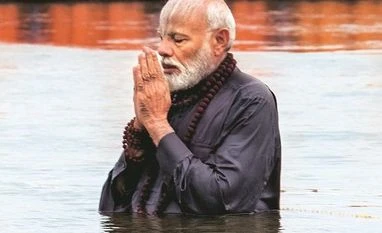 Modi launches PM-Kisan scheme, transfers Rs 2,021 cr to over 10 mn farmers PM Narendra Modi takes a dip at Sangam during Kumbh Mela in Prayagraj, on Sunday PHOTO: PTI
