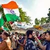 People chant slogans as they celebrate India's major preemptive strike on Jaish-e-Mohammed's camps, in Bikaner