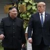 U.S. President Donald Trump, left, and North Korean leader Kim Jong Un shake hands as they meet in Hanoi, Vietnam