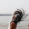 The photograph of a sadhu flipping his hair at the Sangam is a template shot