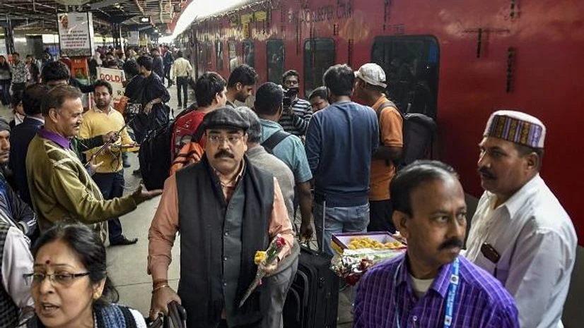 Passengers celebrate as Rajdhani Express, India's first luxury train, running between Howrah and New Delhi, completes 50 years Passengers celebrate as Rajdhani Express, India's first luxury train, running between Howrah and New Delhi, completes 50 years