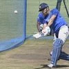 Indian cricketer MS Dhoni bats during a training session ahead of the 3rd ODI match against Australia at JSCA Stadium, in Ranchi. Photo: PTI