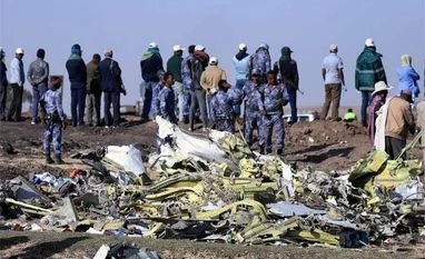 Investigators resume work on analysing Ethiopian Airways' black boxes Ethiopian Federal policemen stand at the scene of the Ethiopian Airlines Flight ET 302 plane crash, near the town of Bishoftu, southeast of Addis Ababa, Ethiopia.