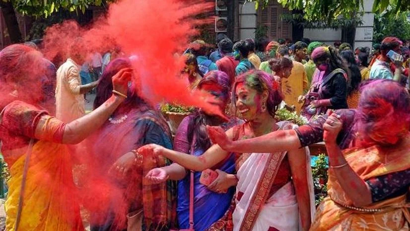 Students of University of Calcutta play with 'Gulal' during 'Holi' celebrations at their campus, in Kolkata Students of University of Calcutta play with 'Gulal' during 'Holi' celebrations at their campus, in Kolkata