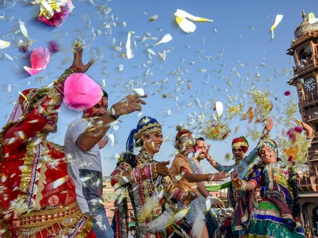 Foreign tourists celebrate Holi festival at Clock Tower in Jodhpur Foreign tourists celebrate Holi festival at Clock Tower in Jodhpur
