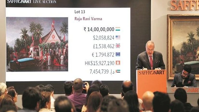 Dinesh Vazirani, Saffronart's CEO and co-founder accepting bids at its Spring Live Auction in Mumbai on Tuesday. Photo: Saffronart Dinesh Vazirani, Saffronart's CEO and co-founder accepting bids at its Spring Live Auction in Mumbai on Tuesday. Photo: Saffronart