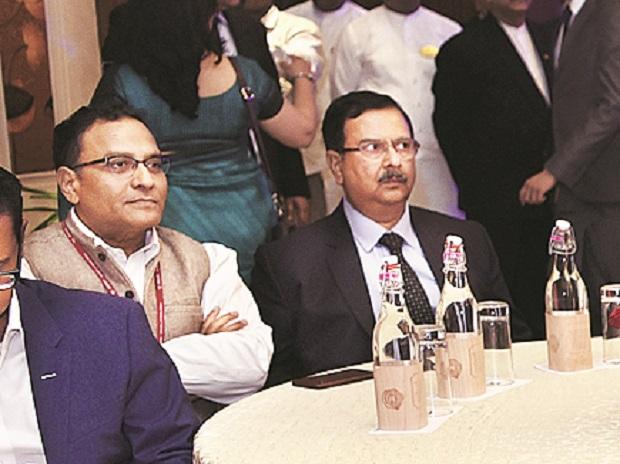 Ayushman Bharat CEO Indu Bhushan and Power Grid Corporation Officiating CMD Ravi P Singh Ayushman Bharat CEO Indu Bhushan and Power Grid Corporation Officiating CMD Ravi P Singh