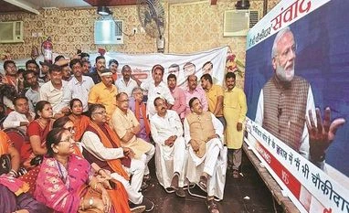 Don't need kings, spirit of 'chowkidar' growing, says Narendra Modi Bharatiya Janata Party workers watch the live telecast of PM Narendra Modi’s speech in Patna on Sunday Photo:PTI