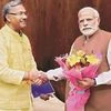 File photo of Uttarakhand CM Trivendra Singh Rawat with PM Narendra Modi