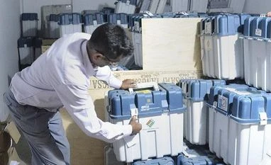 Opposition to appeal SC to verify 50% VVPATs with EVMs in every assembly A polling officer counts the EVMs (Electronic Voting Machines) kept in a strong room after the first phase of general elections, in Dibrugarh, Friday, April 12, 2019. Photo: PTI