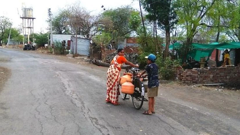 Water crisis Residents of Kolewadi in Osmanabad district, like this woman, are forced to carry pitchers tied to bicycles for a mile or two to reach the tanker point for their supply of drinking water. The locality hasn't ever had any source of drinking water
