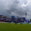 Delhi Capitals players train as dark clouds are seen in the sky above the Ferozshah Kotla Stadium in New Delhi. Photo: PTI