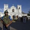 Sri Lankan air force officers and clergy stand outside St. Anthony's Shrine | Photo: PTI