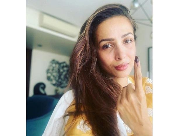Malaika Arora shows her ink-marked finger after casting vote Malaika Arora shows her ink-marked finger after casting vote