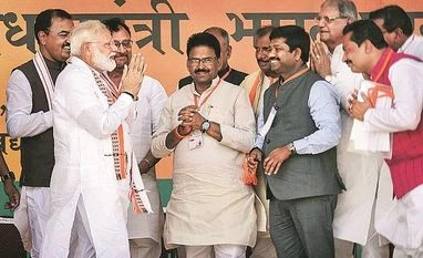 Lok Sabha elections: In Ayodhya, Modi talks Lohia, Ambedkar, but not mandir PM Narendra Modi greets BJP leaders as he arrives to address an election rally for the Lok Sabha polls, at Bharwari in Kaushambi district on Wednesday Photo: PTI