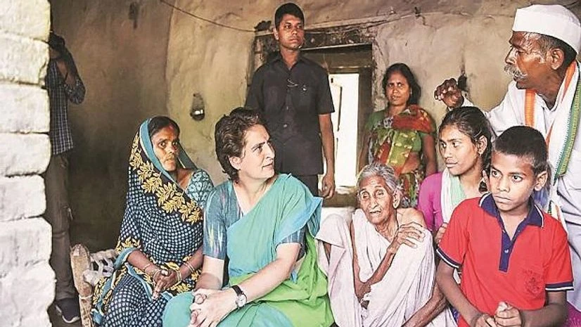 Congress General Secretary Priyanka Gandhi visits party worker Anokhe Lal’s residence during an election campaign in Amethi | Photo: PTI Congress General Secretary Priyanka Gandhi visits party worker Anokhe Lal’s residence during an election campaign in Amethi | Photo: PTI