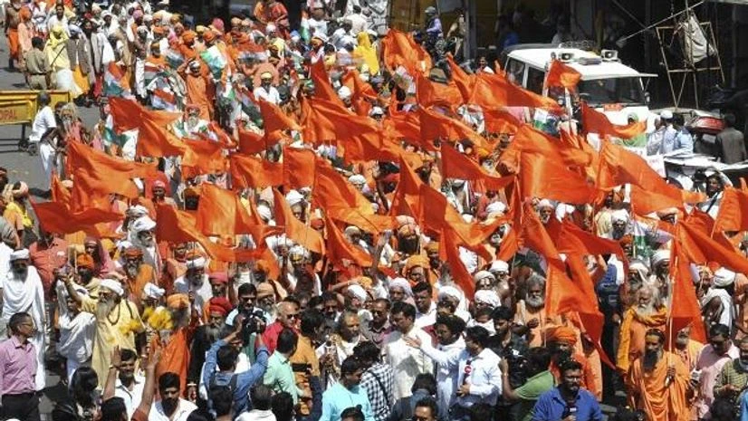 Digvijaya Singh rally, bhopal Congress candidate for Bhopal Lok Sabha seat Digvijaya Singh along with spiritual leader Namdev Das Tyagi popularly known as 'Computer Baba' and party supporters during an election campaign ahead of the Lok Sabha polls
