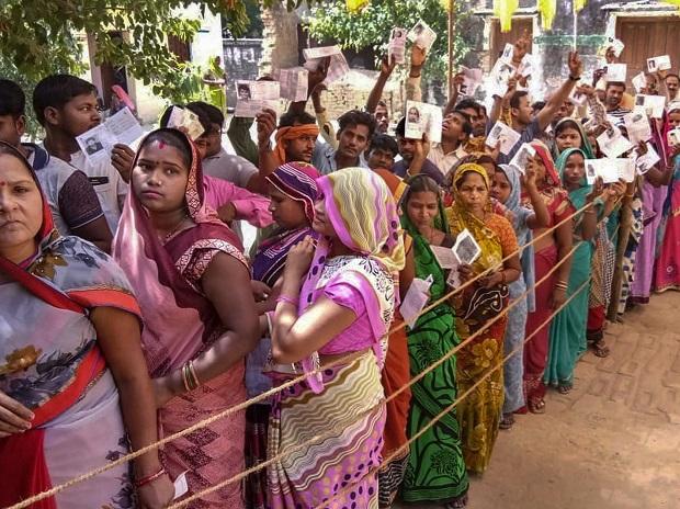elections, voting People wait in a queue to cast their vote during the sixth phase of Lok Sabha elections, in Sultanpur | Photo: PTI