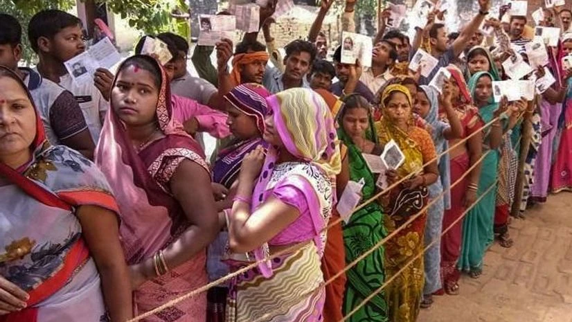elections, voting People wait in a queue to cast their vote during the sixth phase of Lok Sabha elections, in Sultanpur | Photo: PTI
