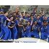 Mumbai Indians (MI) skipper Rohit Sharma with his teammates celebrating with Indian Premier League 2019 winning trophy after win over Chennai Super Kings (CSK) at the Final cricket match at Rajiv Gandhi International Cricket Stadium in Hyderabad. Pho