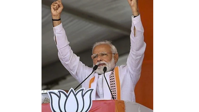 Prime Minister addresses a rally Ratlam: Prime Minister Narendra Modi gestures as he addresses an election campaign rally for the ongoing Lok Sabha polls, in Ratlam, Monday, May 13, 2019. (PTI Photo)
