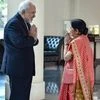 External Affairs Minister Sushma Swaraj greets Iranian Foreign Minister Mohammad Javad Zarif  in New Delhi on Tuesday 	Photo: PTI