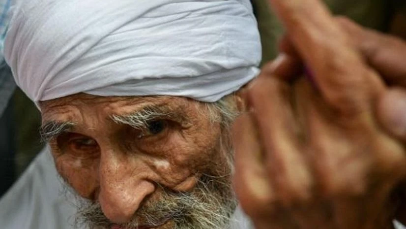 Bachan Singh, 111, Delhi’s oldest voter. Photo: PTI Bachan Singh, 111, Delhi’s oldest voter. Photo: PTI