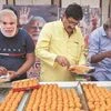 Lok Sabha elections 2019, sweets, modi mask