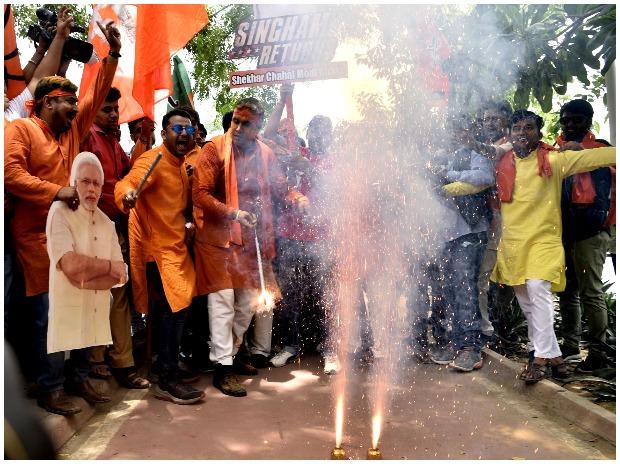 BJP supporters celebrate the party's lead in the 2019 Lok Sabha polls BJP supporters celebrate the party's lead in the 2019 Lok Sabha polls