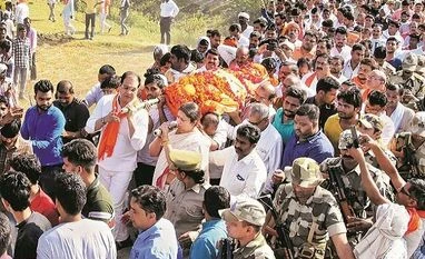 Smriti Irani's aide shot dead in Amethi; FIR lodged against 5 persons BJP MP Smriti Irani during the funeral procession of former village head Surendra Singh, in Amethi PHOTO: PTi